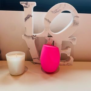 Big pink beauty blender for makeup